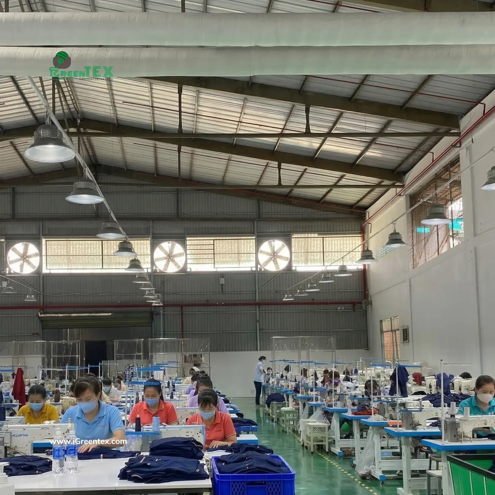 iGreen Tex workers sewing polo shirts. This illustrates the key difference in textile manufacturers vs cloth manufacturers for US brands.