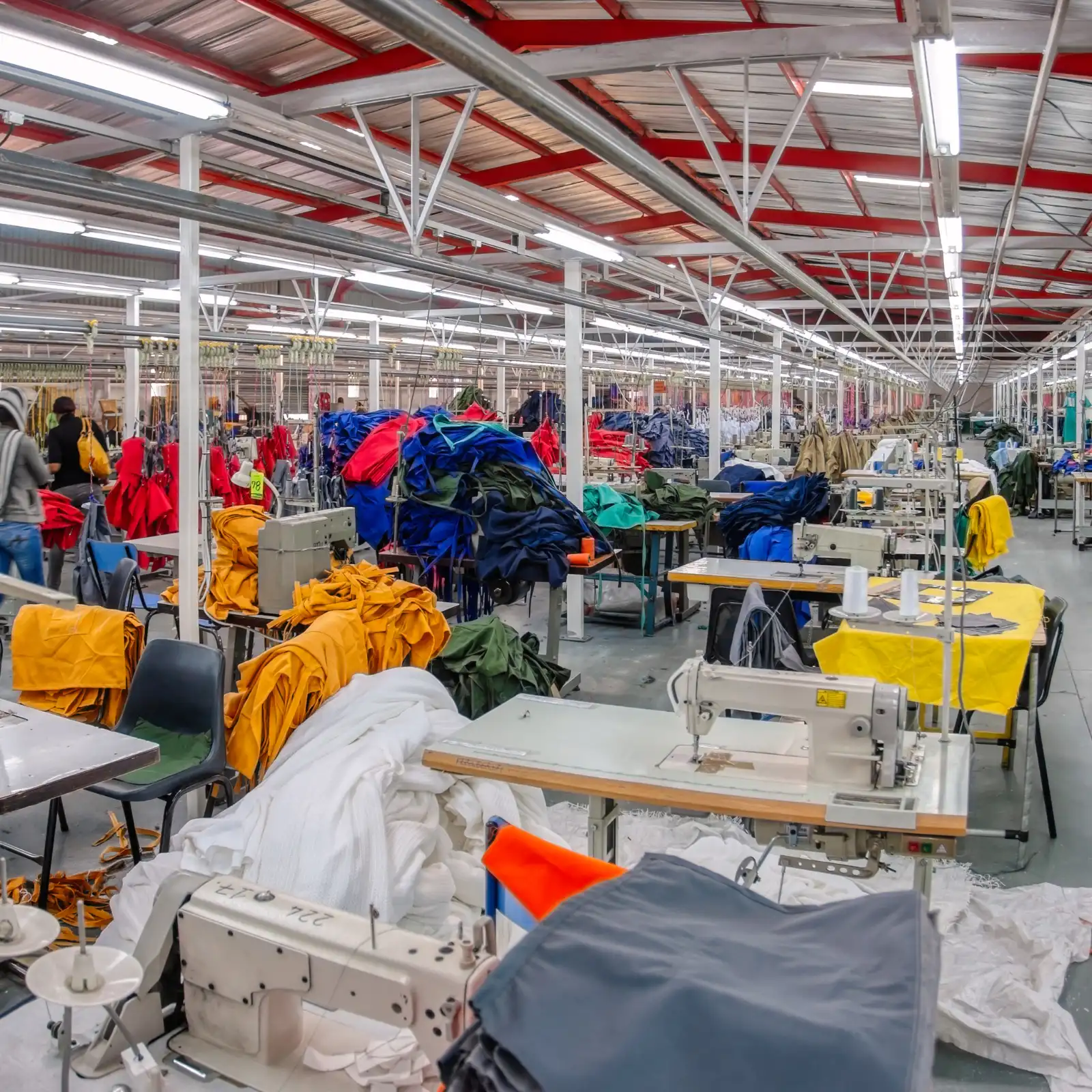 A high-quality introductory image showcasing an organized apparel production floor, representing the manufacturing standards expected in the top clothing manufacturing countries.