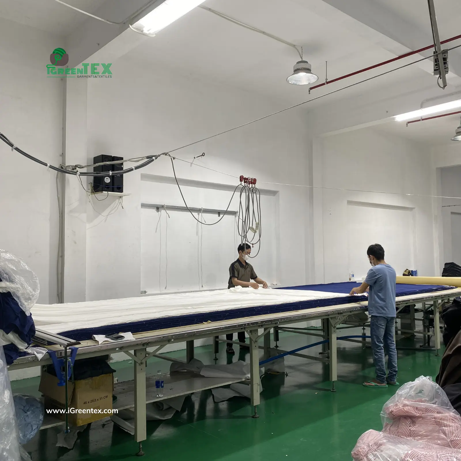 Workers on assembly lines managing steps of the oem vs odm manufacturing process.